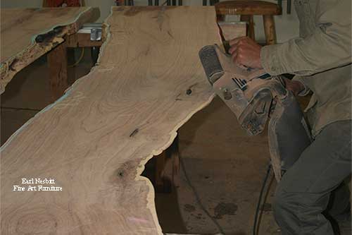 Earl belt sanding mesquite slabs for custom made live edge dining table